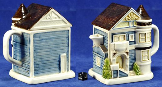 Bule decorativo em ceramica em forma de casa