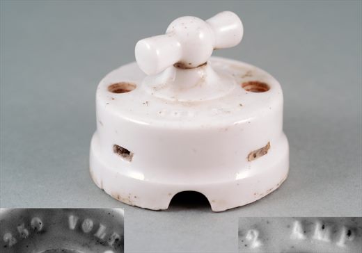 Interruptor de parede de porcelana redondo com manipulo em T