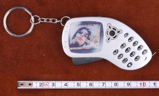 Isqueiro porta chaves em forma de telemovel com fita metrica